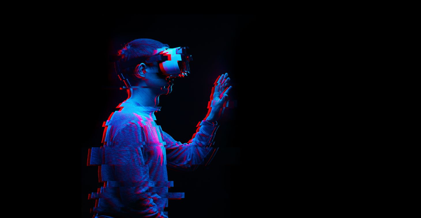Image of a person with VR on that conveys early stage development.